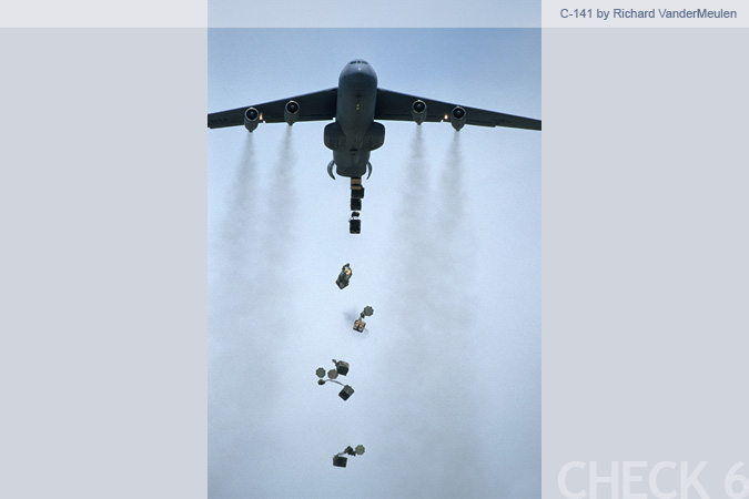 C-141 Starlifter Cargo Drop by Richard Vandermeulen