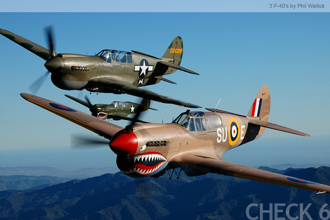 P-40's in Flight - by Phil Wallick